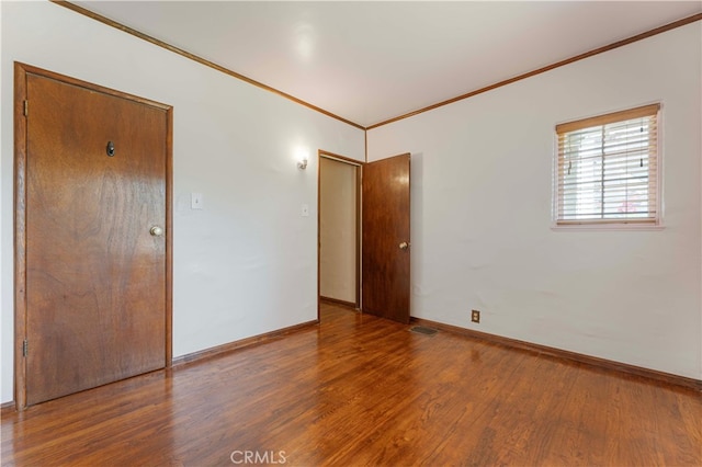 1194 Avoca Ave, Pasadena, CA 91105 - unfurnished room with crown molding, wood finished floors, and baseboards