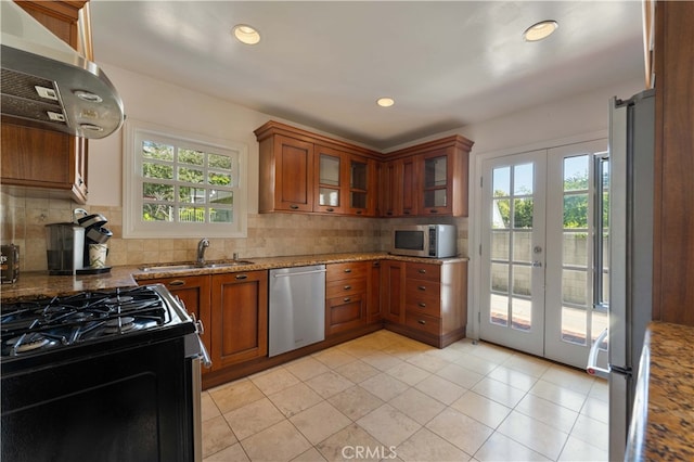 1194 Avoca Ave, Pasadena, CA 91105 - kitchen featuring stainless steel appliances, a sink, exhaust hood, french doors, and brown cabinets