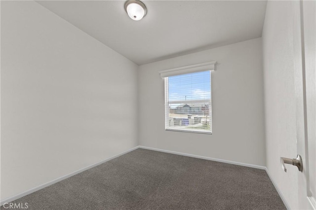 2289 Kyla Ct, San Bernardino, CA 92410 - unfurnished room with dark colored carpet and baseboards