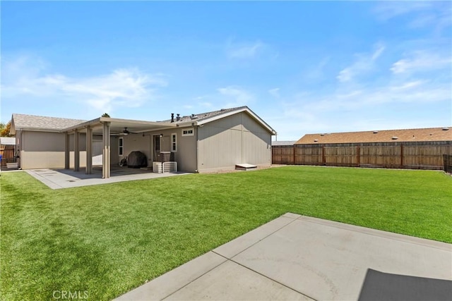 2289 Kyla Ct, San Bernardino, CA 92410 - back of property with a ceiling fan and a patio area
