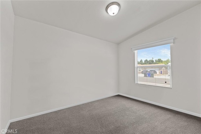 2289 Kyla Ct, San Bernardino, CA 92410 - carpeted spare room with lofted ceiling and baseboards