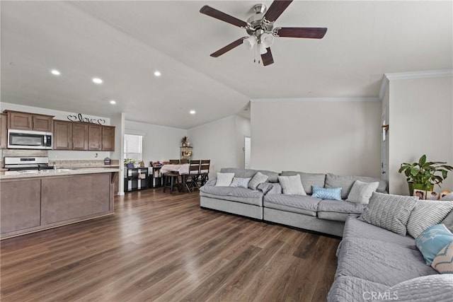 2289 Kyla Ct, San Bernardino, CA 92410 - living area featuring a ceiling fan, dark wood-style flooring, crown molding, recessed lighting, and vaulted ceiling