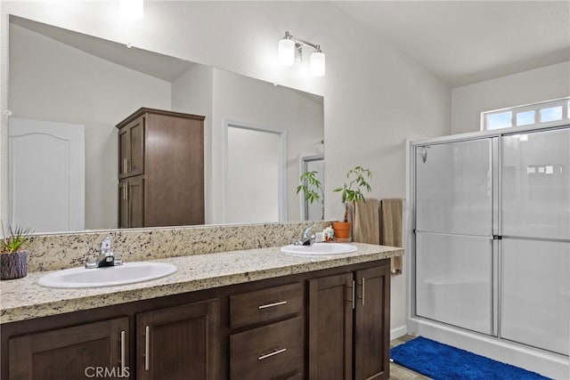 2289 Kyla Ct, San Bernardino, CA 92410 - bathroom featuring a shower stall and double vanity