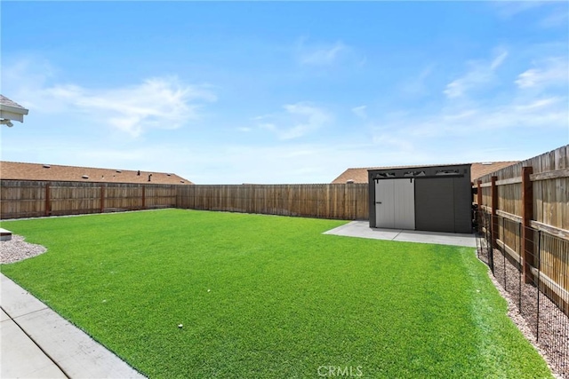 2289 Kyla Ct, San Bernardino, CA 92410 - view of yard featuring an outbuilding and a storage shed