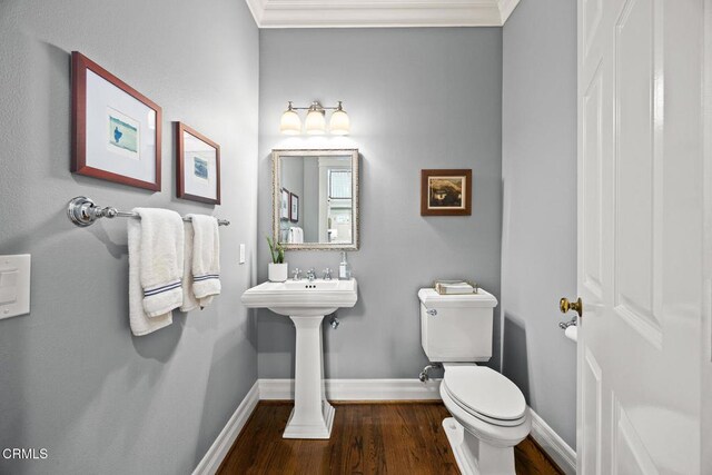 260 W Carter Ave, Sierra Madre, CA 91024 - half bathroom with baseboards, toilet, wood finished floors, and ornamental molding