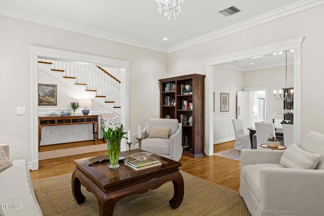 260 W Carter Ave, Sierra Madre, CA 91024 - living area featuring a chandelier, wood finished floors, crown molding, recessed lighting, and stairs