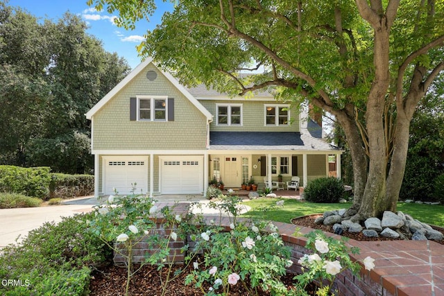 260 W Carter Ave, Sierra Madre, CA 91024 - view of front of property with a porch, concrete driveway, a garage, and a shingled roof