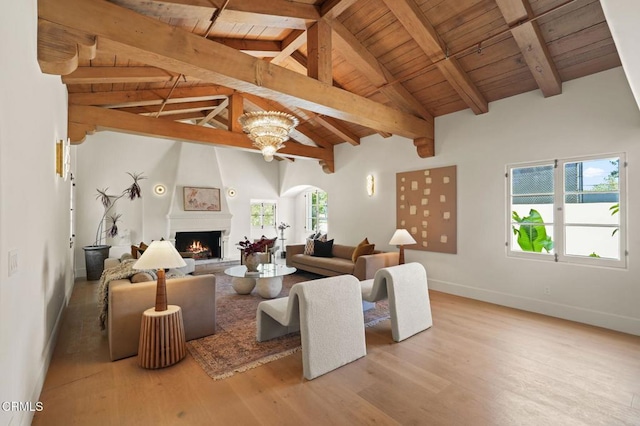 620 S Allen Ave, San Marino, CA 91108 - living room featuring wood ceiling, beam ceiling, wood finished floors, a large fireplace, and baseboards