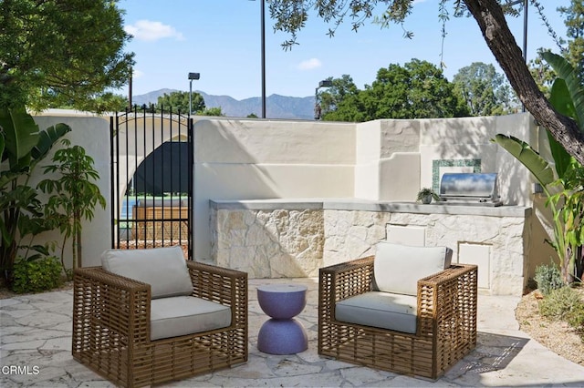 620 S Allen Ave, San Marino, CA 91108 - view of patio with a mountain view, fence, and a gate