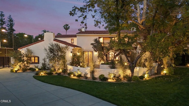 620 S Allen Ave, San Marino, CA 91108 - view of front of house with stucco siding, a chimney, and a tiled roof