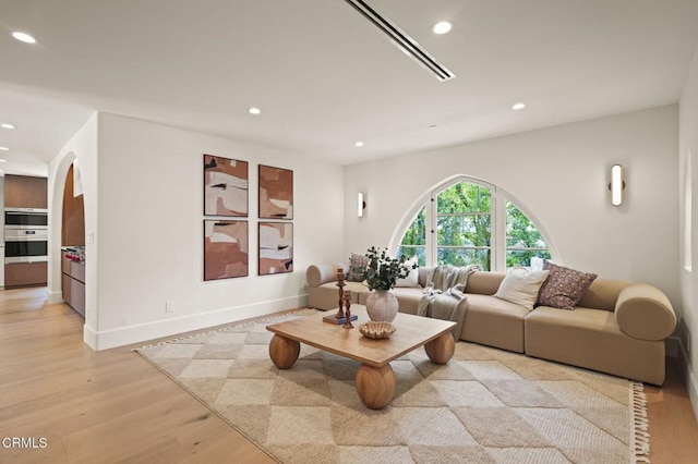620 S Allen Ave, San Marino, CA 91108 - living area with recessed lighting, light wood-style floors, arched walkways, and baseboards
