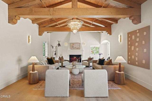 620 S Allen Ave, San Marino, CA 91108 - living area with wooden ceiling, a fireplace, baseboards, wood finished floors, and a chandelier