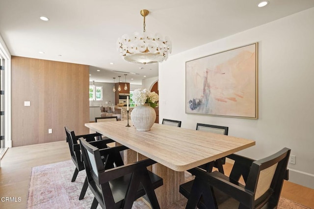 620 S Allen Ave, San Marino, CA 91108 - dining area featuring a chandelier, wood finished floors, recessed lighting, and arched walkways