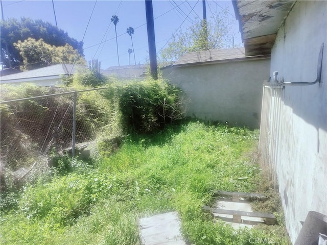 view of yard with fence