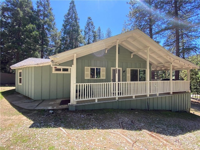 view of front of house with board and batten siding and covered porch