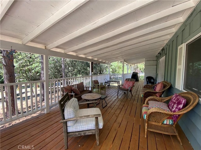 wooden deck with an outdoor hangout area