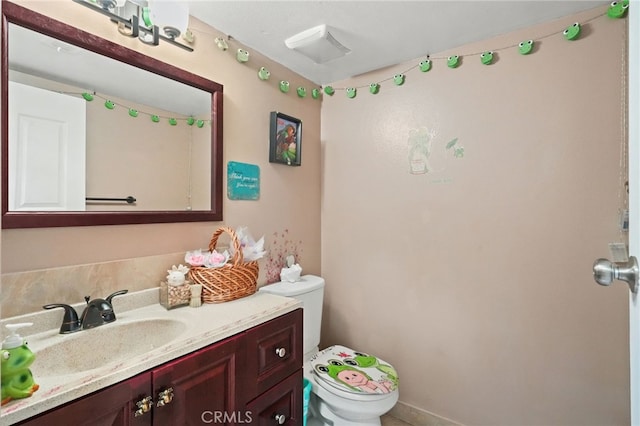 half bath with toilet and vanity