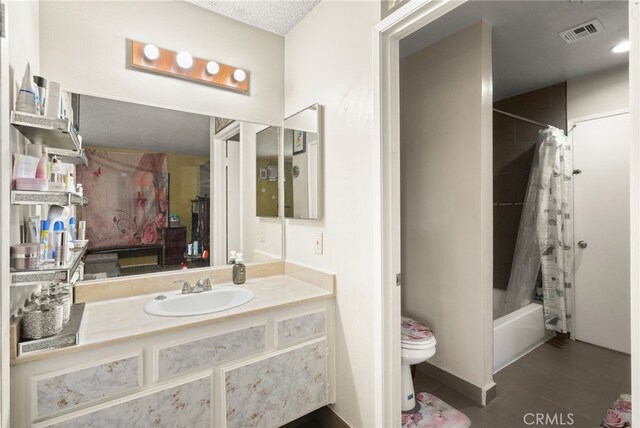 full bath with toilet, vanity, and shower / tub combo with curtain