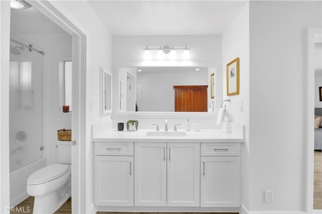 5314 E 4th St, Long Beach, CA 90814 - full bathroom featuring vanity, washtub / shower combination, and toilet