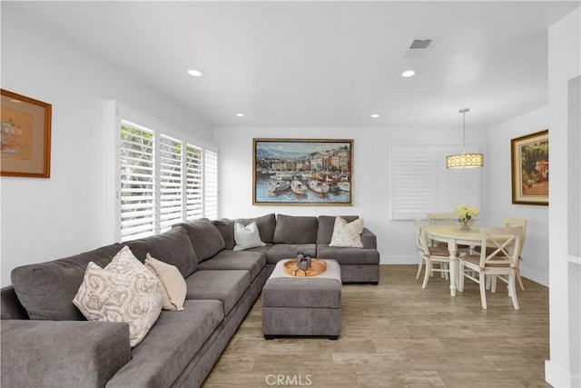 5314 E 4th St, Long Beach, CA 90814 - living room featuring baseboards, light wood-type flooring, and recessed lighting