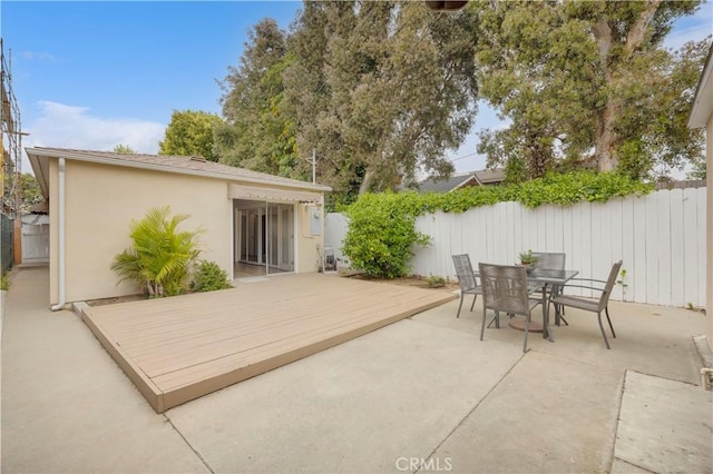 5314 E 4th St, Long Beach, CA 90814 - view of patio / terrace featuring fence, a deck, and outdoor dining area