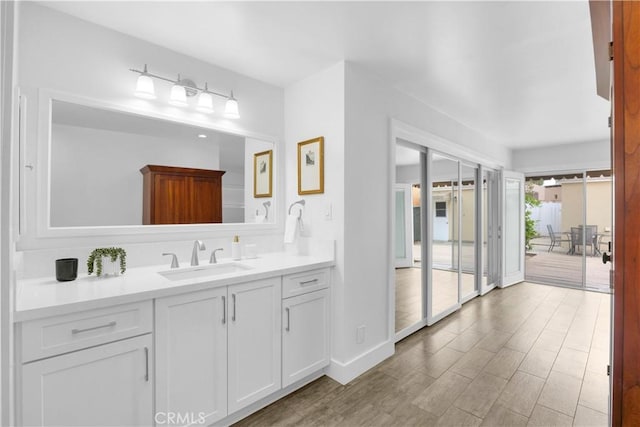 5314 E 4th St, Long Beach, CA 90814 - bathroom featuring vanity and wood finished floors