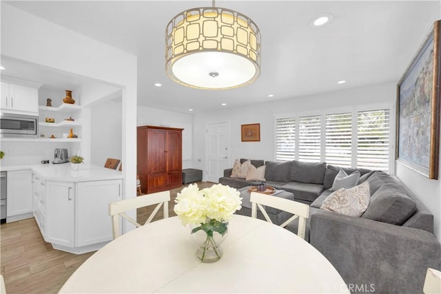5314 E 4th St, Long Beach, CA 90814 - dining space with light wood-style flooring and recessed lighting