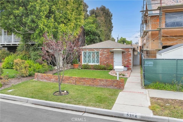 5314 E 4th St, Long Beach, CA 90814 - view of front of home with brick siding and a shingled roof