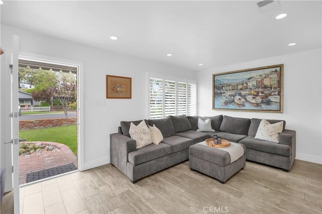5314 E 4th St, Long Beach, CA 90814 - living room featuring healthy amount of natural light, recessed lighting, baseboards, and light wood-style floors