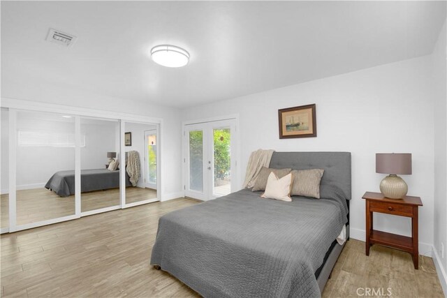 5314 E 4th St, Long Beach, CA 90814 - bedroom featuring access to outside, baseboards, and wood finished floors