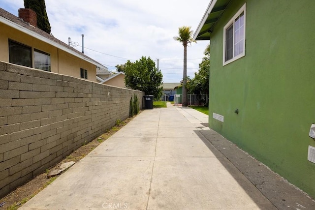 2224 Mortimer St, Huntington Park, CA 90255 - view of home's exterior with fence, stucco siding, and a patio area