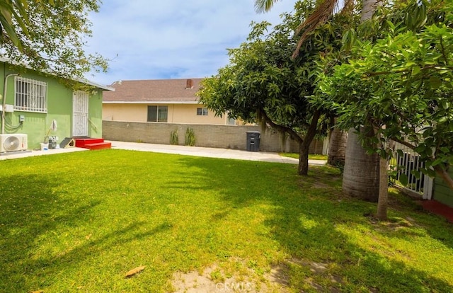 2224 Mortimer St, Huntington Park, CA 90255 - view of yard with ac unit, entry steps, and a patio