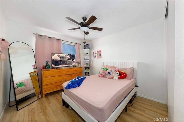 10693 Berrywood Cir, Yucaipa, CA 92399 - bedroom featuring light wood-style flooring, baseboards, and ceiling fan