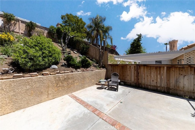 10693 Berrywood Cir, Yucaipa, CA 92399 - fenced backyard with a patio