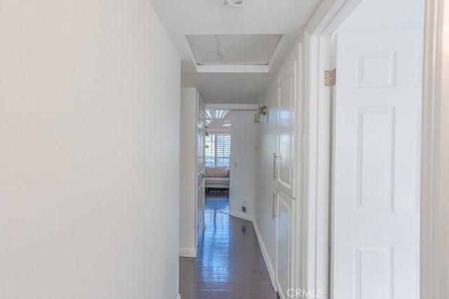 18213 Flynn Dr Unit 132, Canyon Country, CA 91387 - corridor with baseboards and dark wood-style floors