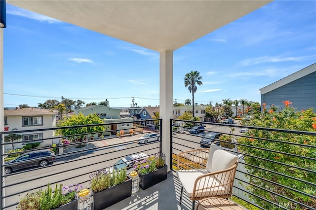 balcony featuring a residential view