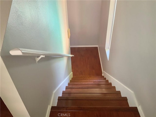 stairway with baseboards
