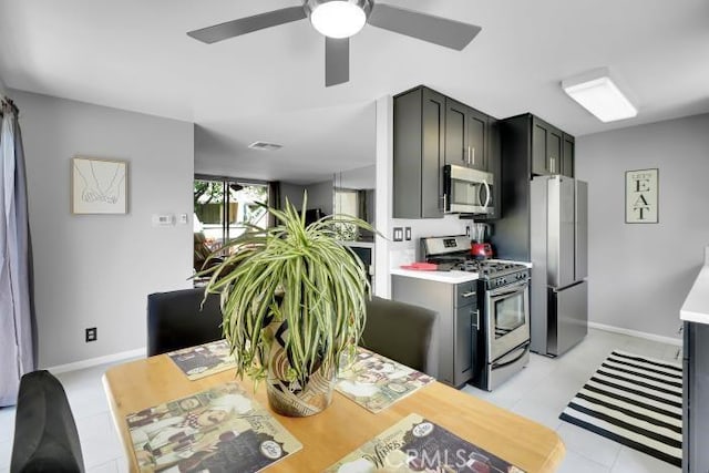 9917 Independence Ave Unit C, Chatsworth, CA 91311 - kitchen with stainless steel appliances, light countertops, and ceiling fan