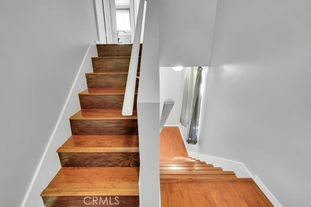 9917 Independence Ave Unit C, Chatsworth, CA 91311 - stairs featuring baseboards