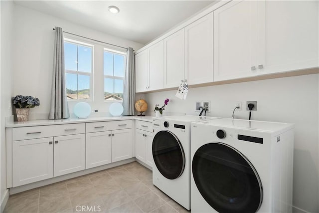 26288 Meadow Dr, San Juan Capistrano, CA 92675 - laundry room with independent washer and dryer, cabinet space, and light tile patterned floors