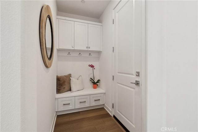 26288 Meadow Dr, San Juan Capistrano, CA 92675 - mudroom featuring dark wood-type flooring and baseboards