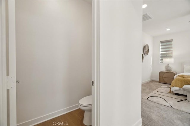26288 Meadow Dr, San Juan Capistrano, CA 92675 - bathroom featuring baseboards, toilet, and recessed lighting