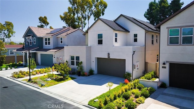 26288 Meadow Dr, San Juan Capistrano, CA 92675 - view of front facade with stucco siding, a garage, and concrete driveway