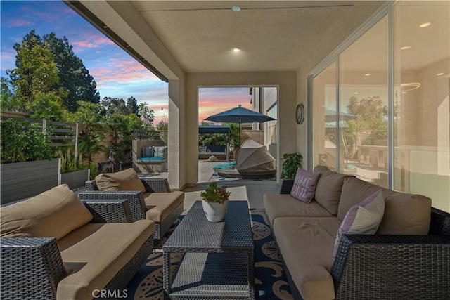 26288 Meadow Dr, San Juan Capistrano, CA 92675 - patio terrace at dusk featuring an outdoor hangout area and a patio area