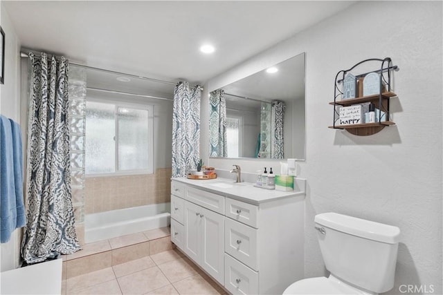 full bath with toilet, tile patterned floors, vanity, recessed lighting, and shower / tub combo with curtain