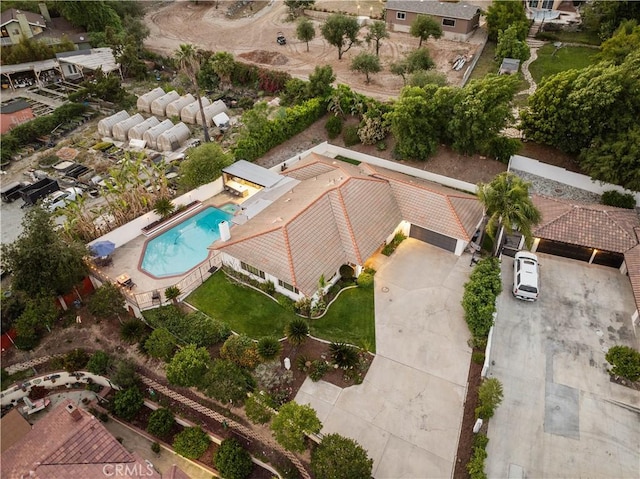 view of subject property with a pool area