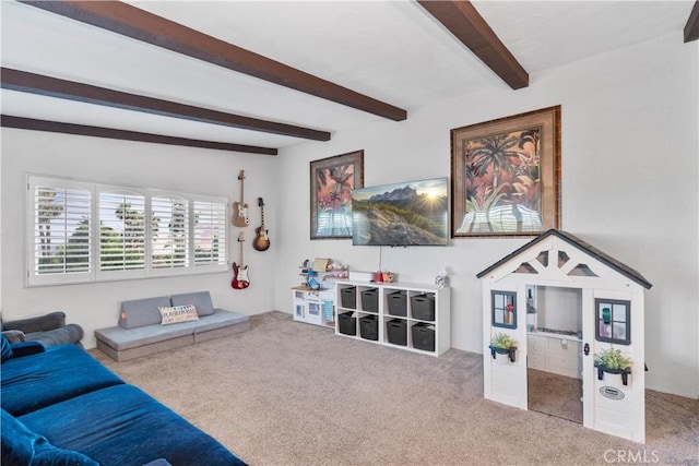 living room with carpet floors and beamed ceiling