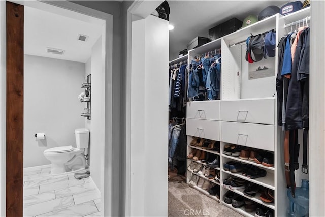 2485 San Mateo Dr, Upland, CA 91784 - spacious closet with marble look tile flooring