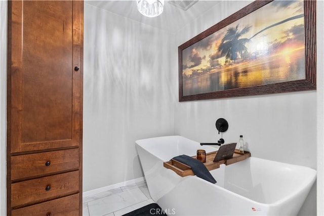 2485 San Mateo Dr, Upland, CA 91784 - full bathroom featuring a freestanding tub and marble finish flooring