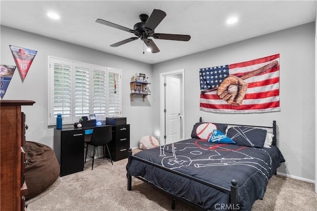 carpeted bedroom with recessed lighting, a desk, a ceiling fan, and baseboards